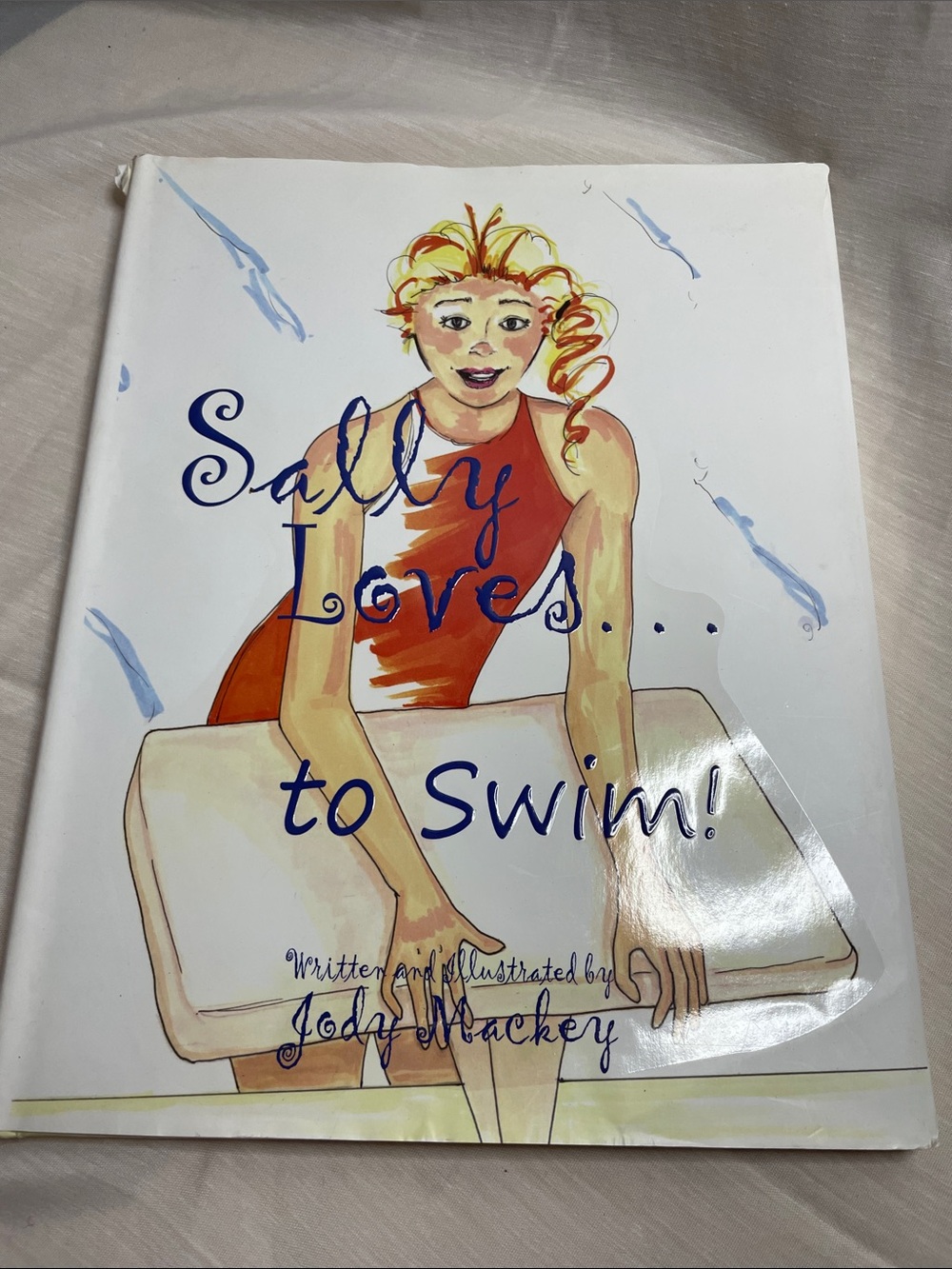 Sally Loves to Swim! – Kids Picture Book (White, Orange Illustration)